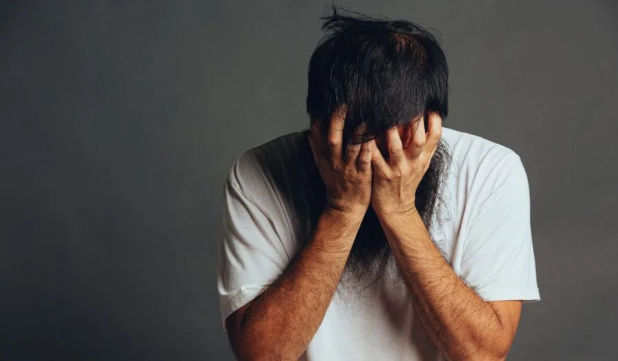 Man experiencing depression and emotional distress