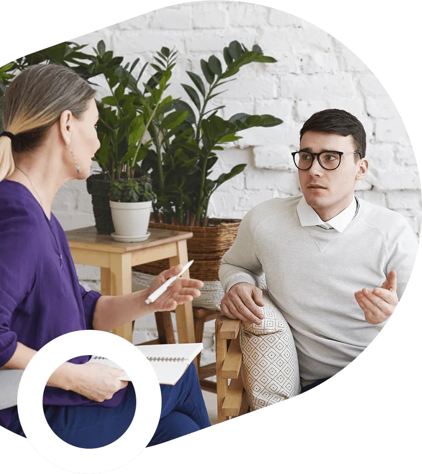 Patient discussing concerns with therapist during consultation session