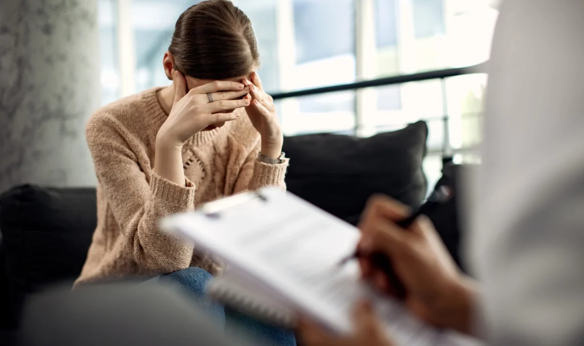 Woman struggling with depression during therapy session